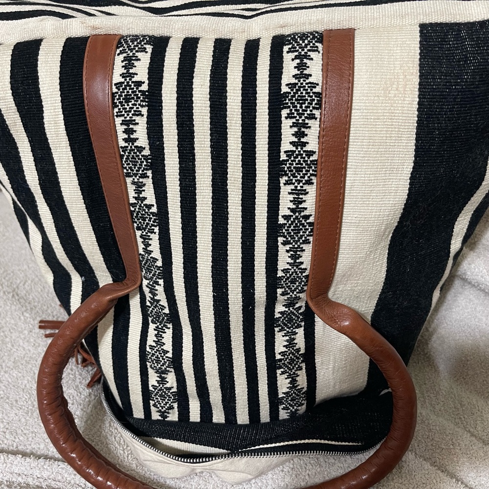 Elegant Black and White Striped Backpack with Brown Accents - Picture 9 of 9